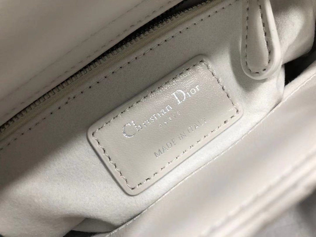 The Lady Dior three-compartment flap classic Lady Dior bag embodies - Image 9