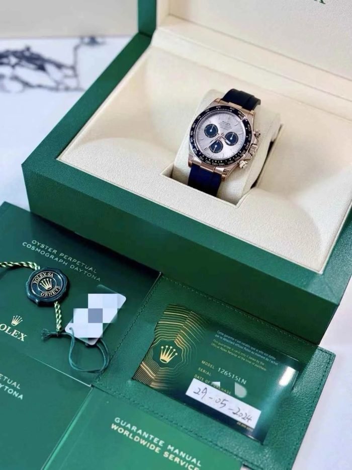 The Oyster Perpetual Cosmograph Daytona in 18 ct Everose gold features a sunrise gold and gloss black dial and an Oysterflex strap with a black Cerachrom bezel with tachymeter. -m126515ln-0006 40mm - Image 11