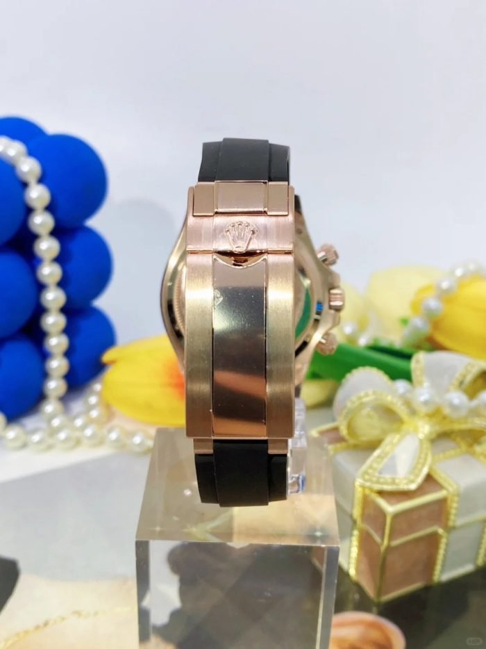 The Oyster Perpetual Cosmograph Daytona in 18 ct Everose gold features a sunrise gold and gloss black dial and an Oysterflex strap with a black Cerachrom bezel with tachymeter. -m126515ln-0006 40mm - Image 3