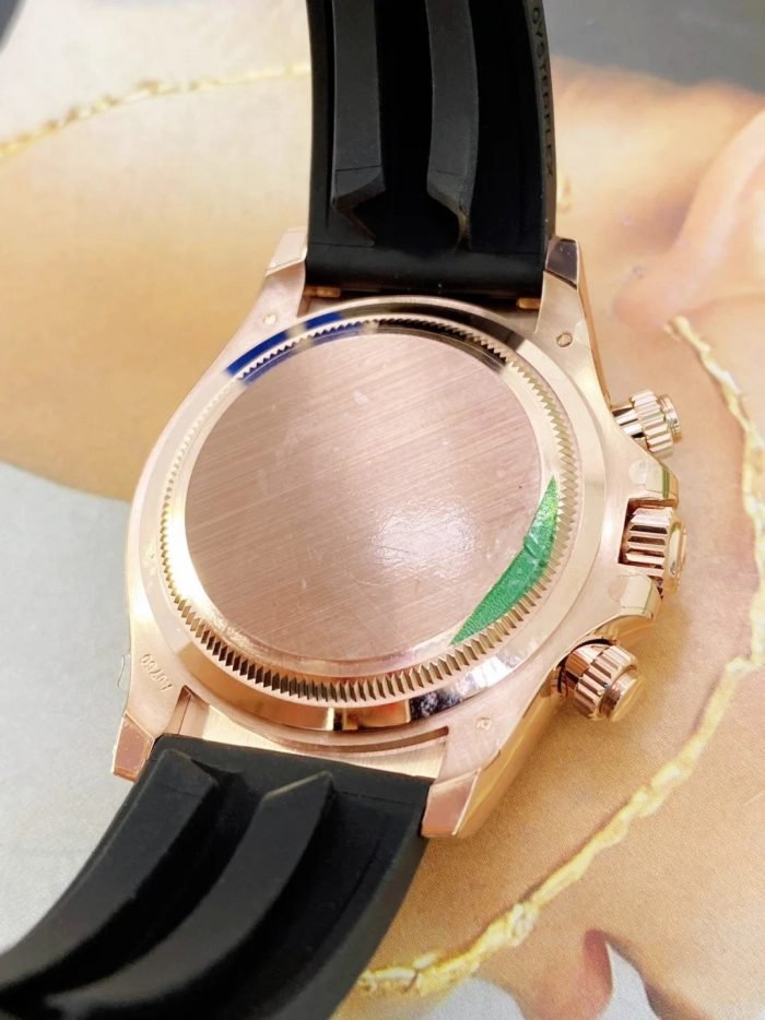 The Oyster Perpetual Cosmograph Daytona in 18 ct Everose gold features a sunrise gold and gloss black dial and an Oysterflex strap with a black Cerachrom bezel with tachymeter. -m126515ln-0006 40mm - Image 7