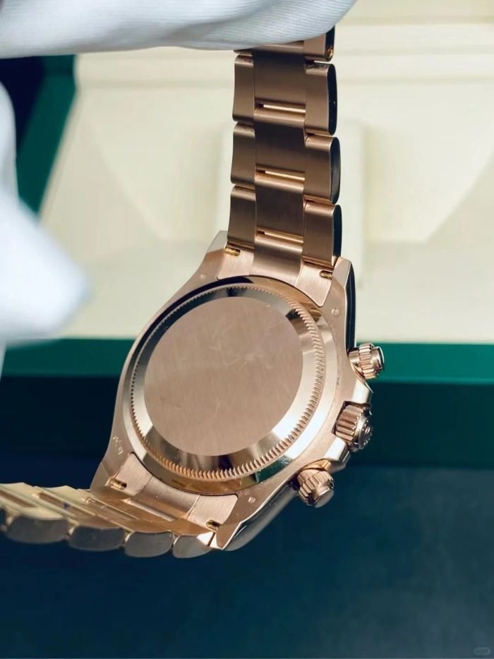 The Oyster Perpetual Cosmograph Daytona in 18 ct Everose gold features a glossy black and sunrise gold dial and an Oyster bracelet with an engraved tachymeter on an 18-carat Everose gold bezel. -m126505-0001 40mm - Image 12