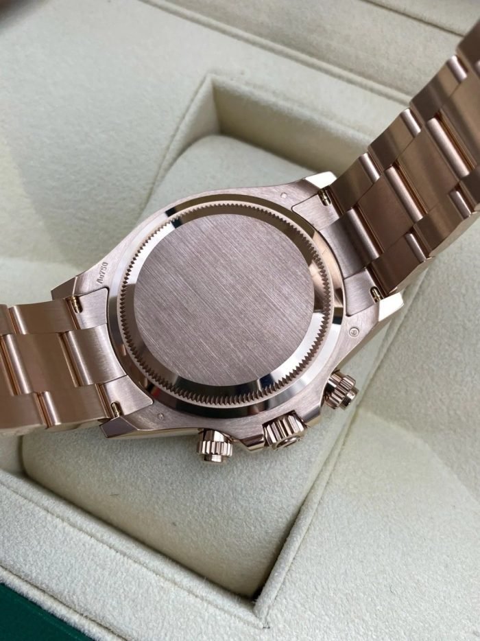 The Oyster Perpetual Cosmograph Daytona in 18 ct Everose gold features a diamond-set gloss black and sunrise gold dial and an Oyster bracelet with an engraved tachymeter on an 18-carat Everose gold bezel. -m126505-0002 40mm - Image 9