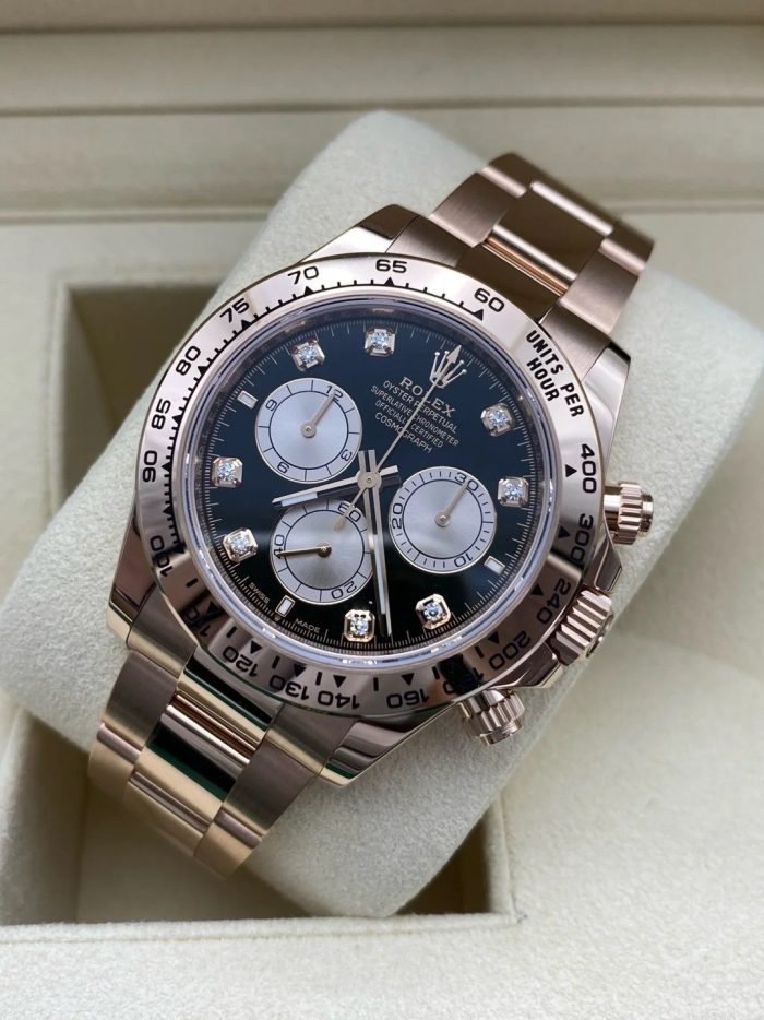 The Oyster Perpetual Cosmograph Daytona in 18 ct Everose gold features a diamond-set gloss black and sunrise gold dial and an Oyster bracelet with an engraved tachymeter on an 18-carat Everose gold bezel. -m126505-0002 40mm - Image 8