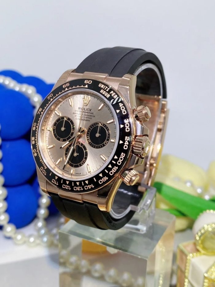 The Oyster Perpetual Cosmograph Daytona in 18 ct Everose gold features a sunrise gold and gloss black dial and an Oysterflex strap with a black Cerachrom bezel with tachymeter. -m126515ln-0006 40mm - Image 4