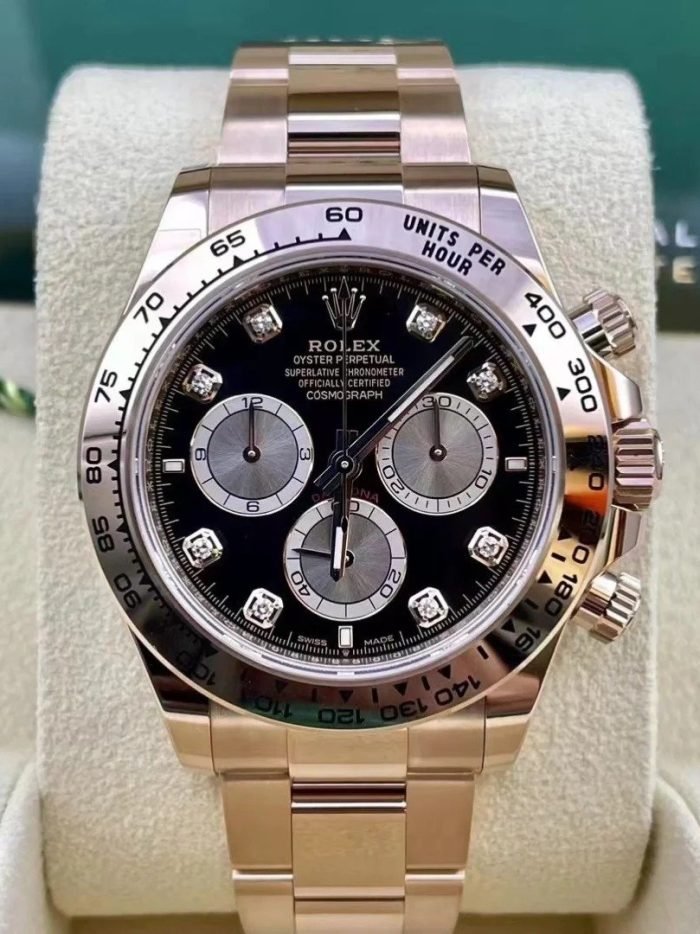 The Oyster Perpetual Cosmograph Daytona in 18 ct Everose gold features a diamond-set gloss black and sunrise gold dial and an Oyster bracelet with an engraved tachymeter on an 18-carat Everose gold bezel. -m126505-0002 40mm - Image 2