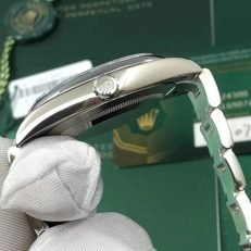 The Oyster Perpetual 41 is presented with a bright blue dial and an Oyster bracelet. -m124300-0003 - Image 24